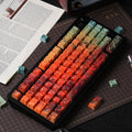 Rustera keycap set — styled flat lay on a desk