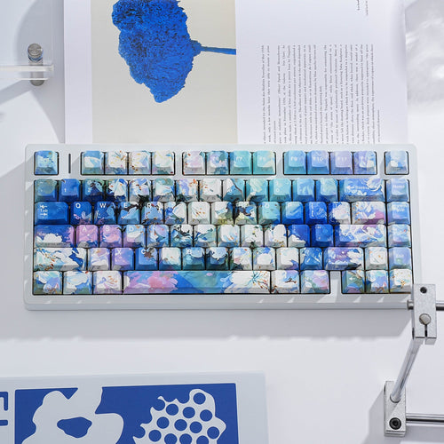 Blossomtime keycap set — top-down on a clean desk