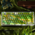SpringMoor keycap set — top-down on green silk