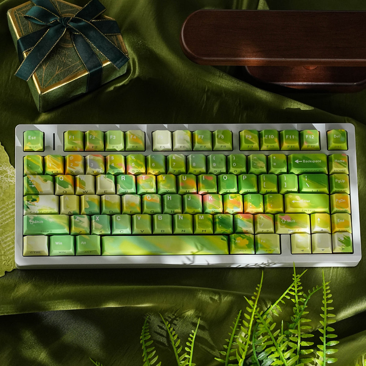 SpringMoor keycap set — top-down on green silk